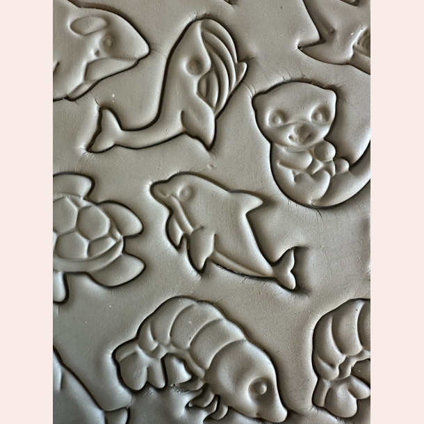 Delfin udstikker med prgning