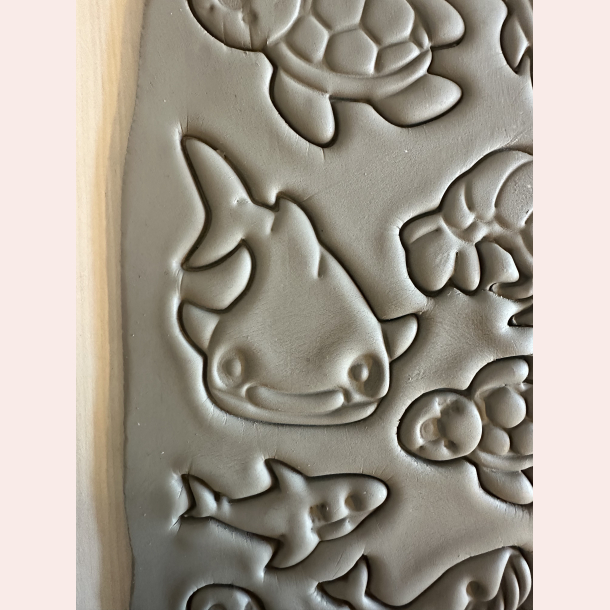 Haj udstikker med prgning