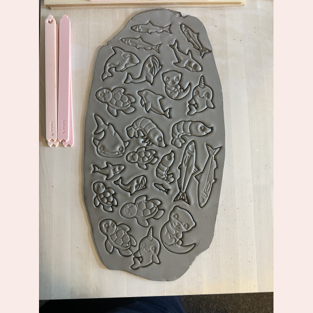 Delfin udstikker med prgning