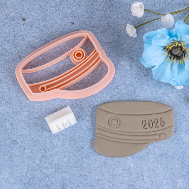 Studenterhue udstikker med pr�gning 