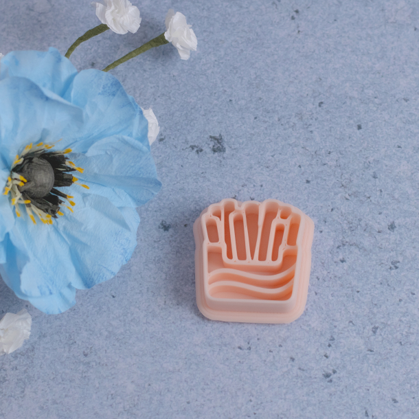 Pomfritter udstikker med prgning